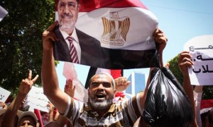 Although Ennahda's situation is much closer to Mohamed Morsi's than the AK party's, the coup is less threatening in Tunis than it is in Ankara. Photograph: Chedly Ben Ibrahim//Demotix/Corbis