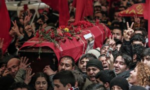 The coffin of Berkin Elvan is carried through Istanbul. He died in hospital today, nine months after being hit by a police teargas cartridge. Photograph: Emrah Gurel/AP