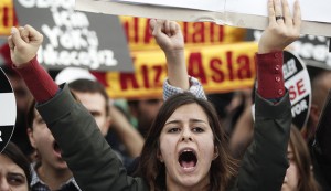 University students shout anti-government slogans during a protest against Turkey's High Education Board in Istanbul
